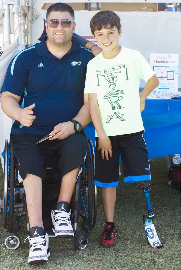 UCLA adaptive recreation coordinator Michael Garafola and athlete Ezra Frech at a competition in October 2014. Courtesy Michael Granola